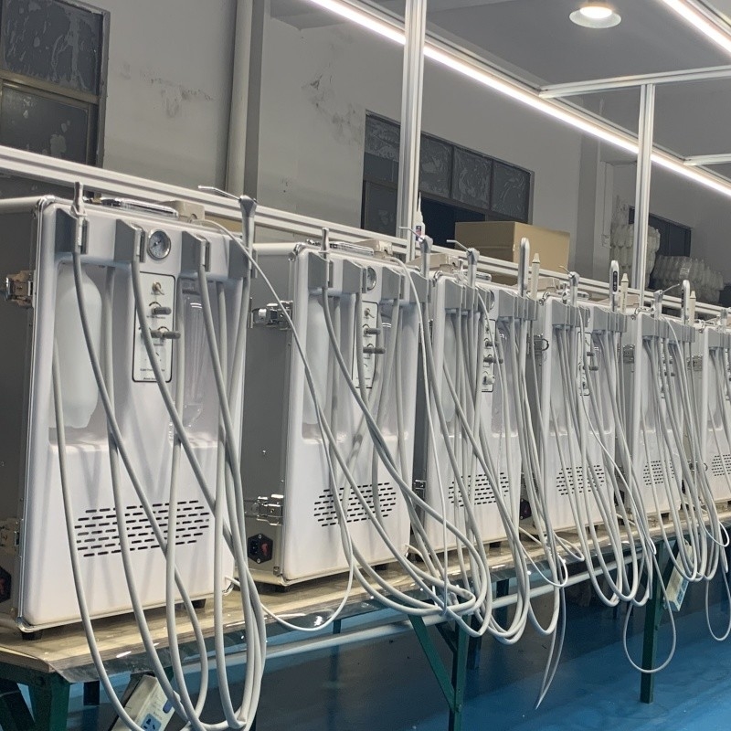 डेंटल मोबाइल कार्ट पोर्टेबल डेंटल यूनिट जिसमें 550W एयर कंप्रेसर है, इच्छानुसार घुमाएँ मोबाइल डेंटल टरबाइन यूनिट